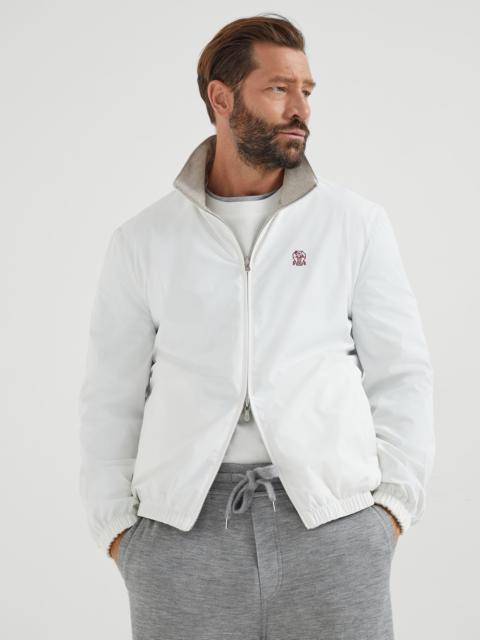 Bonded nylon reversible outerwear jacket with logo