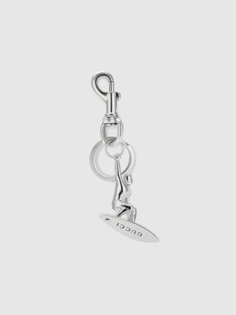 GUCCI Engraved surfer keychain charm