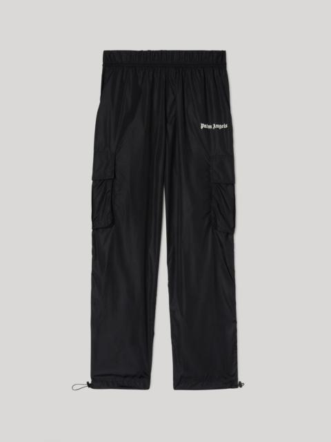 Palm Angels Curved Logo Nylon Track Pants | forward | REVERSIBLE