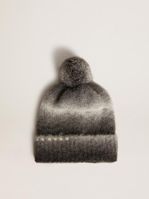 Black and white wool beanie with pompom