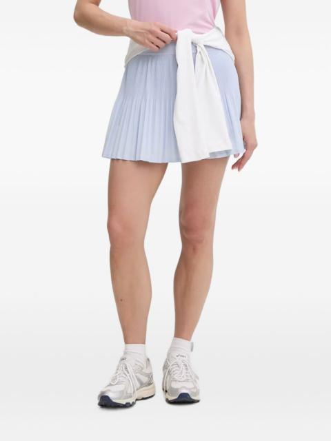 LACOSTE pleated logo-patch mini skirt