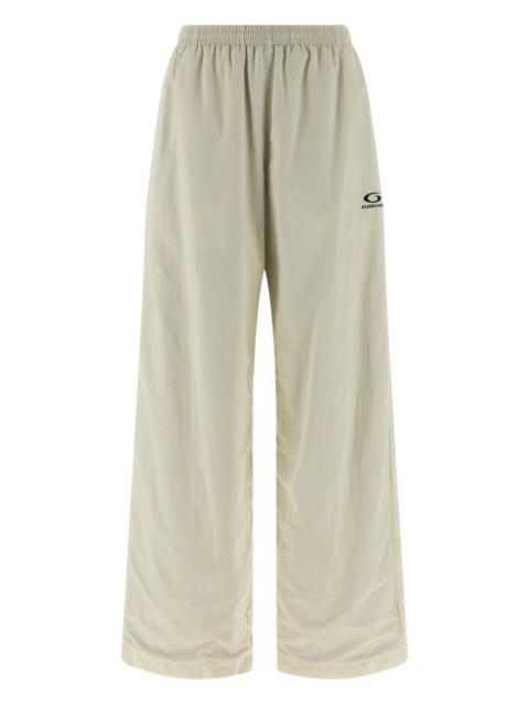 BALENCIAGA wrinkled-effect logo-embroidery trousers
