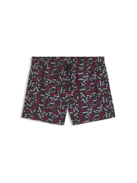 HUGO DRAWSTRING SWIM SHORTS WITH ALL-OVER LOGO PRINT