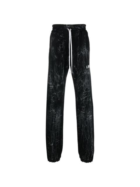 cracked-dye logo track pants