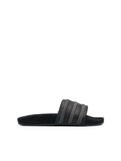 embossed-logo stripe-detail slides