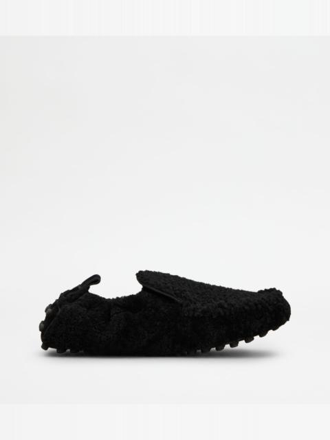 Tod's GLOVE GOMMINO LOAFERS IN SHEARLING - BLACK