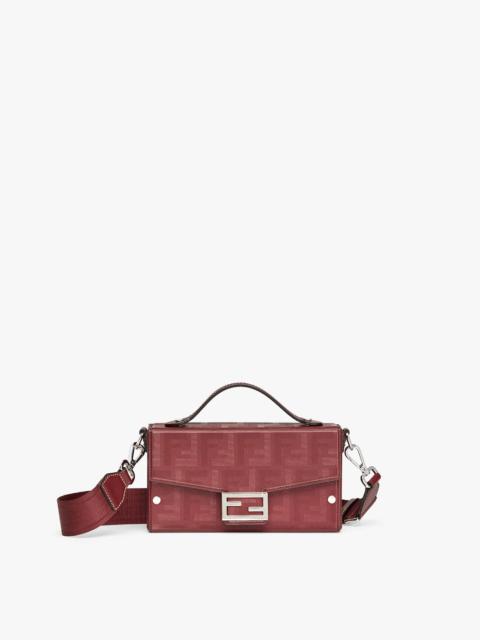 FENDI Baguette Soft Trunk bag made of burgundy leather with a striped texture FF motif. Flap with magnetic