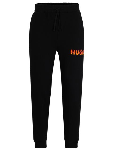 HUGO COTTON-TERRY TRACKSUIT BOTTOMS WITH PUFFED FLAME LOGO
