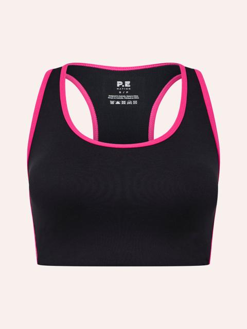 P.E NATION STELLAR SPORTS BRA IN BLACK & COSMO PINK