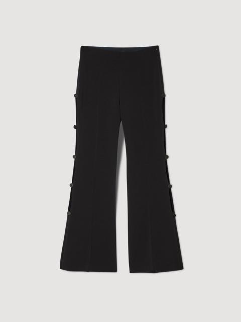 FLARED TROUSERS WITH CUTAWAY SIDES
