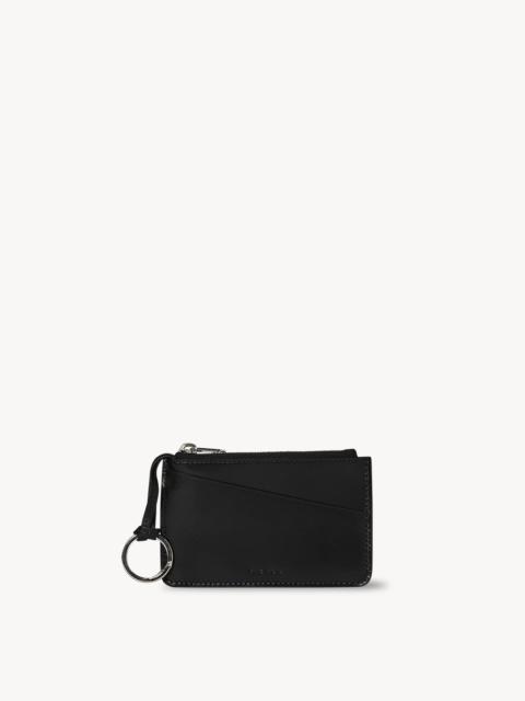 The Row Zipped Keychain in Leather