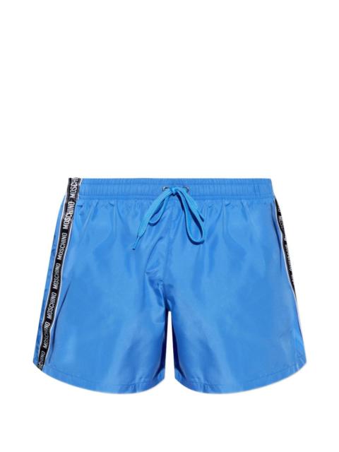 Moschino logo-tape swim shorts