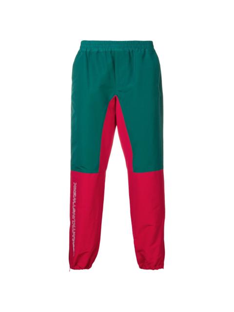 JOHNUNDERCOVER colour-block track trousers