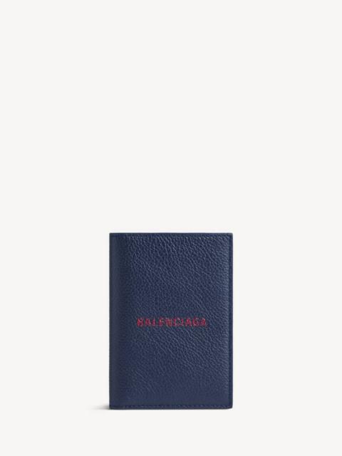 BALENCIAGA Men's Cash Vertical Bifolded Wallet in Navy/burgundy