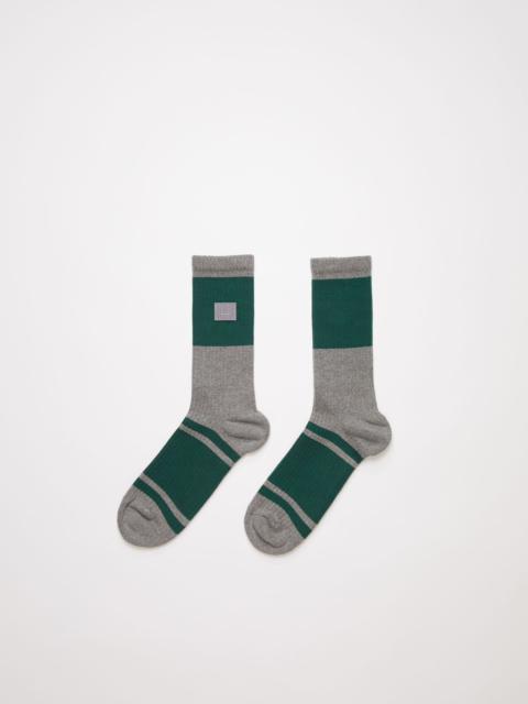 Acne Studios Face patch striped socks grey melange/forest green