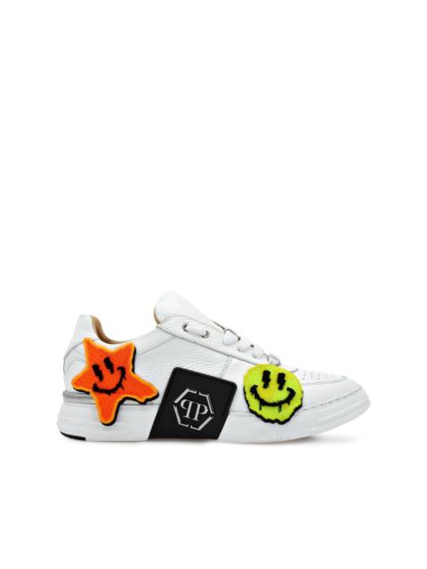 graffiti-embroidered lace-up sneakers