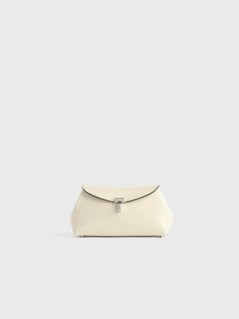 TOTEME Mini T-lock naplack clutch milk