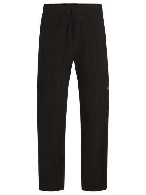 HUGO TAPERED-FIT TRACKSUIT BOTTOMS IN RIPSTOP COTTON