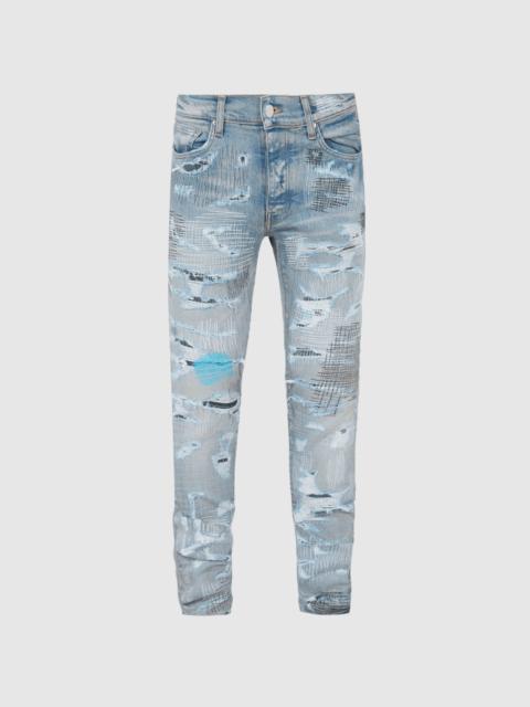 AMIRI ALL OVER REPAIR DENIM