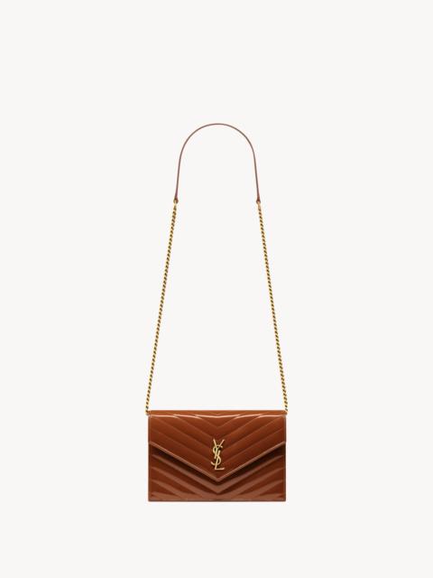 SAINT LAURENT CASSANDRE ENVELOPE CHAIN WALLET IN PATENT LEATHER