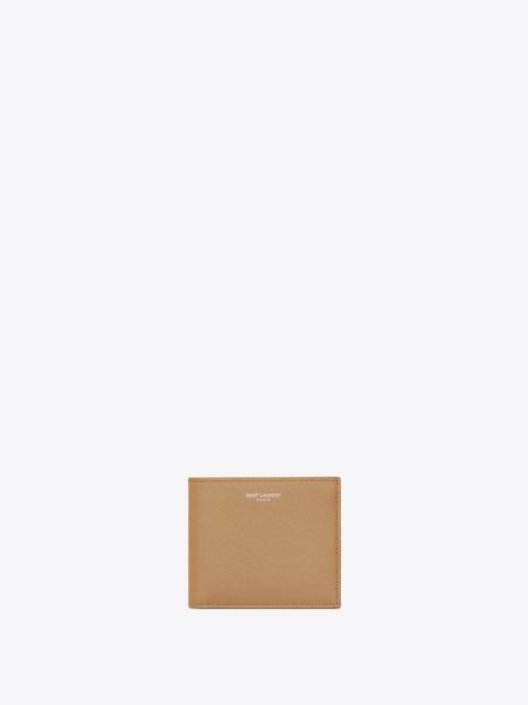 East/West zip-around wallet in grain de poudre embossed leather, Saint  Laurent