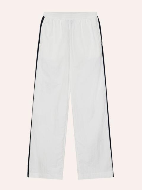 P.E NATION RELAY SPRAY TRACK PANT IN WHITE & DARK NAVY