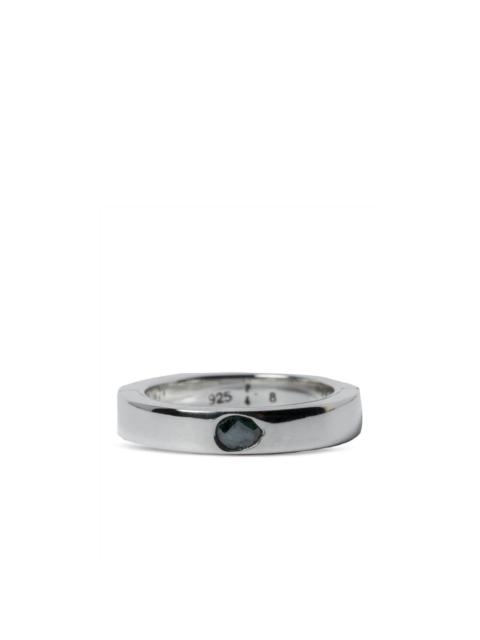 Parts of Four Sistema blue-diamond ring