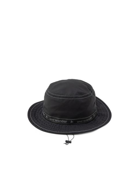and Wander JQ Tape bucket hat