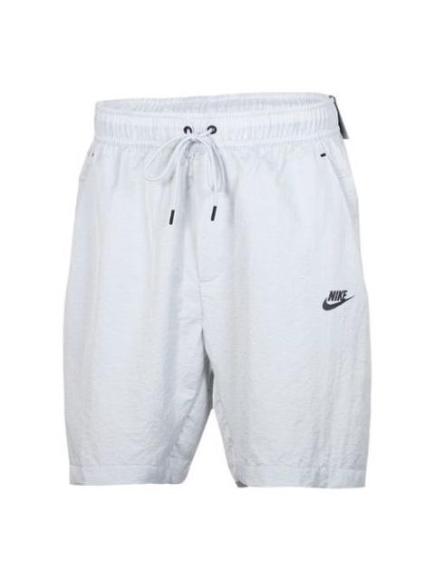 Nike Nike 스포츠 길쌈된 반바지 밝은 회색 AR3230-043