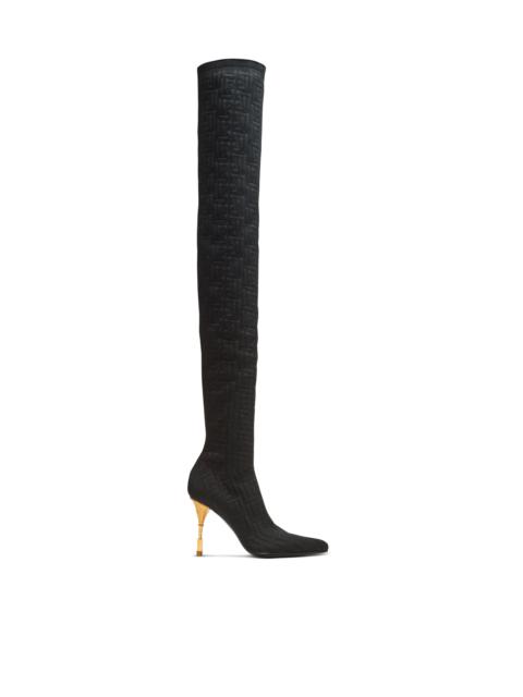 Balmain Moneta monogrammed knit thigh-high boots