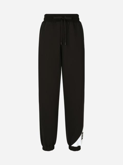 Dolce & Gabbana Cotton jogging pants with logo