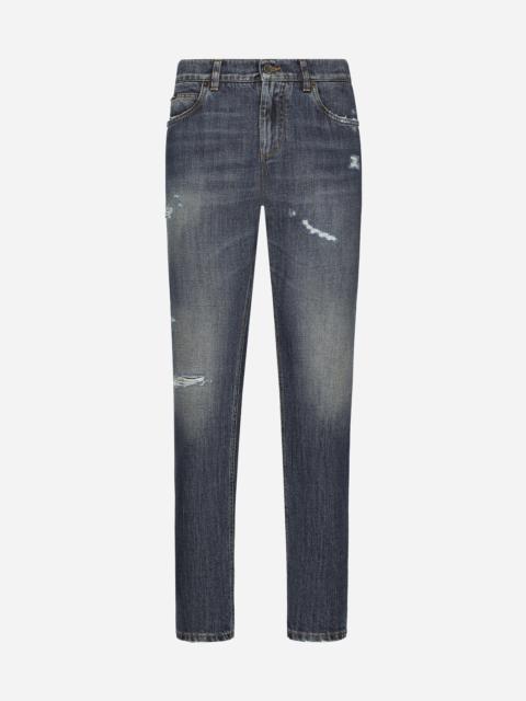 Regular-fit blue wash jeans with abrasions
