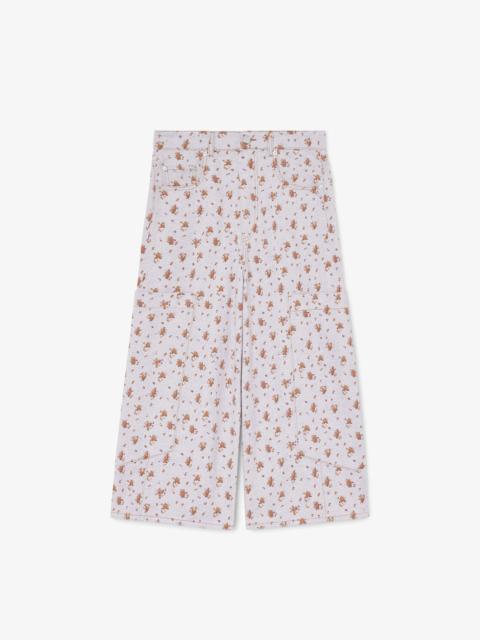 GANNI BAGGY CROPPED JEANS IN PRINTED DENIM