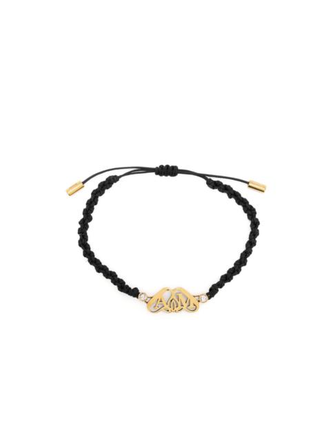 Alexander McQueen Seal-plaque braided-strap bracelet