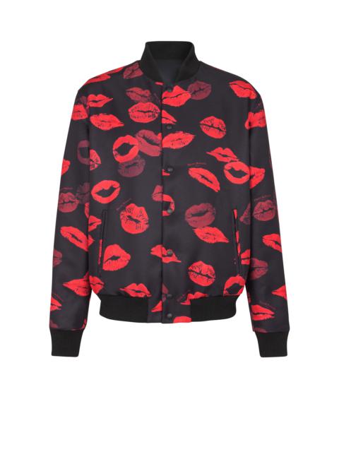 Reversible bomber jacket in plain and Kiss-print nylon