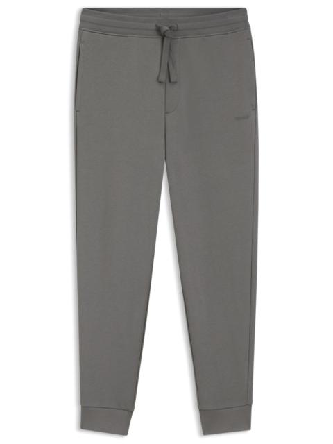 HUGO CUFFED SWEATPANTS IN COTTON TERRY WITH LOGO PRINT