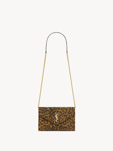 SAINT LAURENT CASSANDRE ENVELOPE CHAIN WALLET IN CANVAS