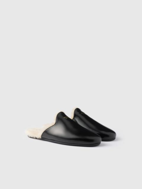 Prada Brushed leather and shearling mules
