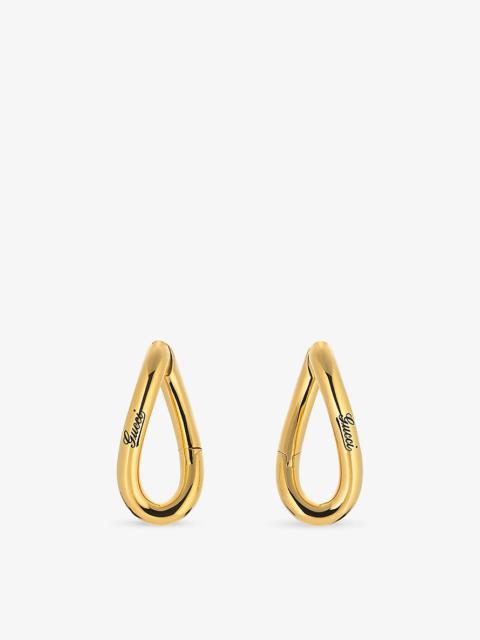 Geometrical logo-engraved metal hoop earrings