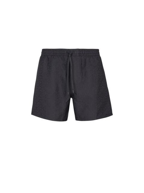 Monogrammed swim shorts