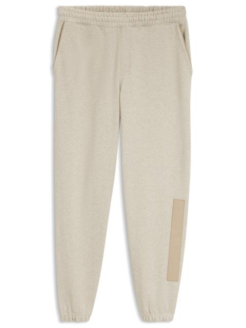 HUGO RELAXED-FIT SWEATPANTS IN COTTON WITH LOGO TRIM