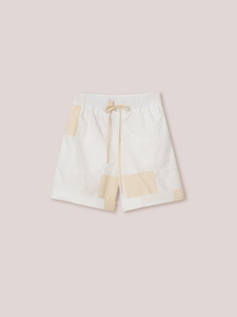 Nanushka LINDE - Upcycled patchwork relaxed shorts - White/eggshell