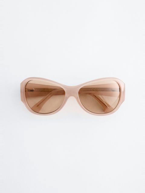 & Other Stories Oversized Curved Sunglasses