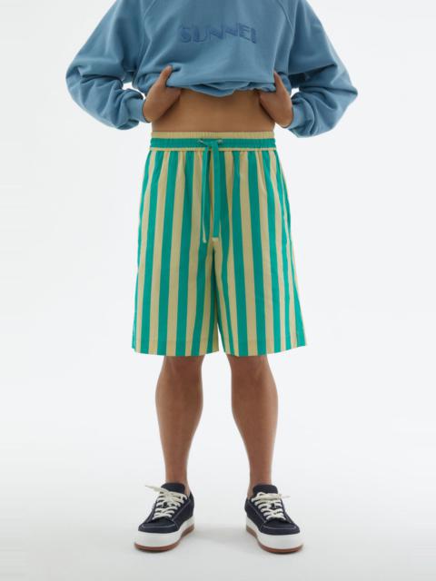 SHORT ELASTIC PANTS WITH GREEN & YELLOW STRIPES