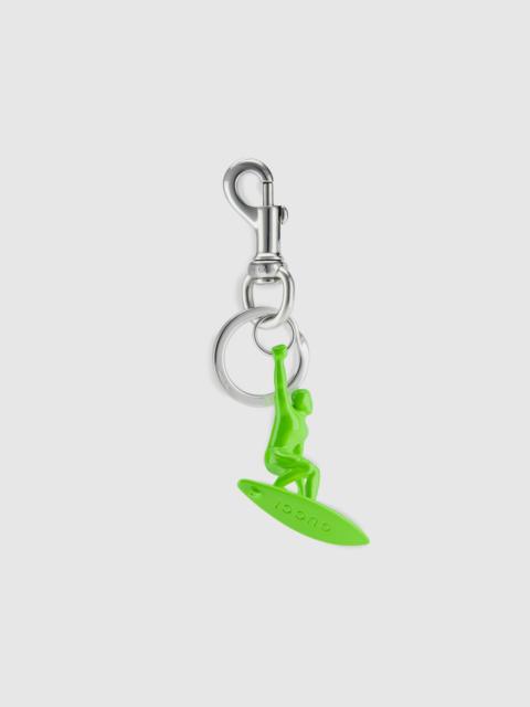 GUCCI Engraved surfer keychain charm