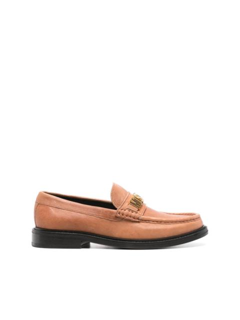 Moschino logo-plaque suede loafers