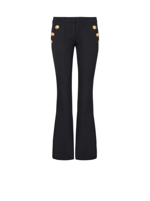 Flared trousers with buttons