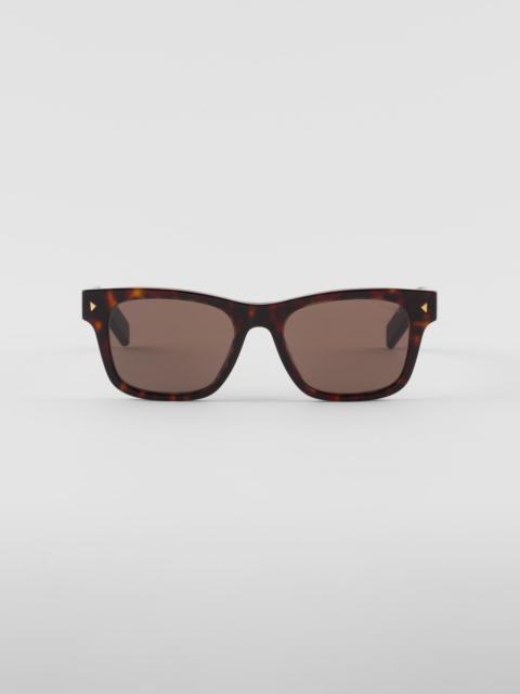 Prada Sunglasses with iconic metal plaque