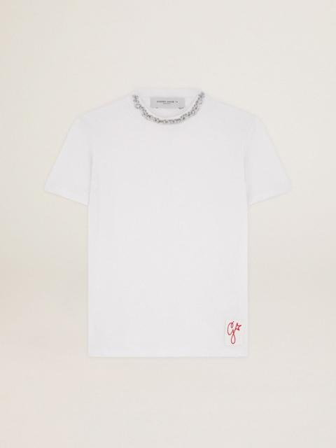 Women's white T-shirt with cabochon crystals