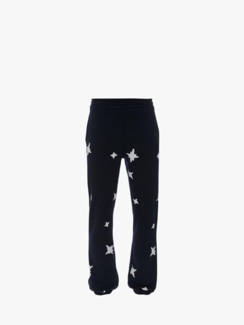 JW Anderson REMBRANDT STAR PRINT TRACK PANTS